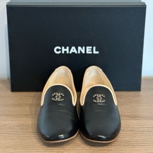 Women’s Chanel genuine leather loafers. New, never worn. Size 8.